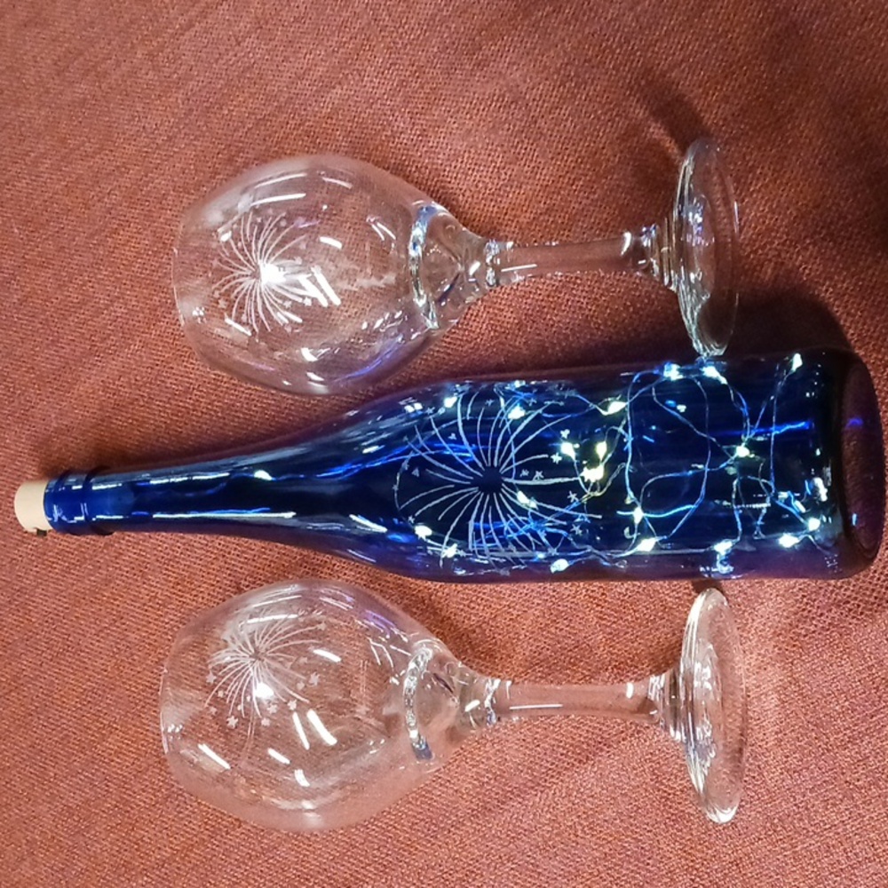 Hand Etched Wine bottle and glasses.